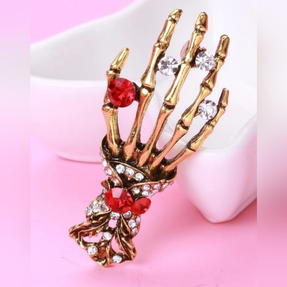 Gold plated red and white crystal skeleton hand necklace/brooch - Picture 7 of 11